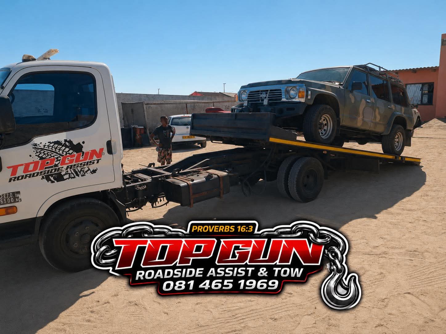Top Gun tow truck with Nissan Patrol loaded